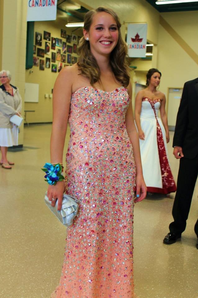 Prom Photographer my niece wears her bejeweled slim fitting peach colored gown at her formal march in 2013