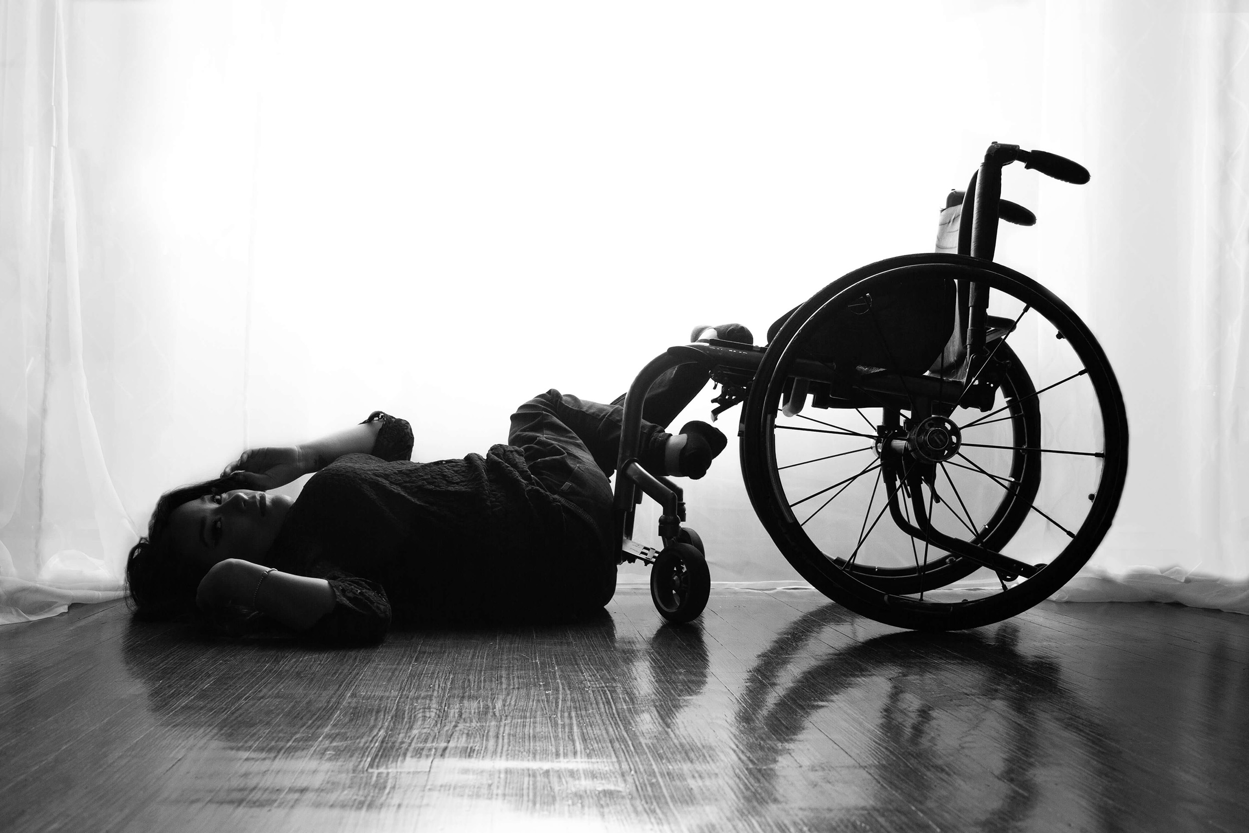 Boudoir Saskatoon Photographer wheelchair dependent boudoir black and white silhouette